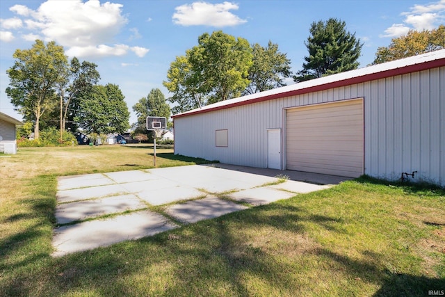 garage with a lawn