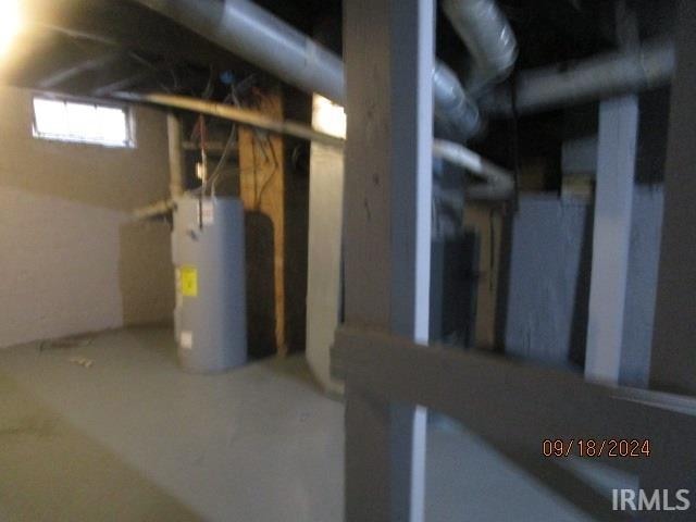 basement featuring gas water heater