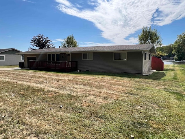 back of house with a yard