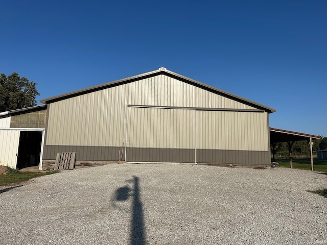 view of outdoor structure with a carport