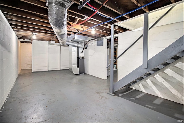 basement featuring heating unit