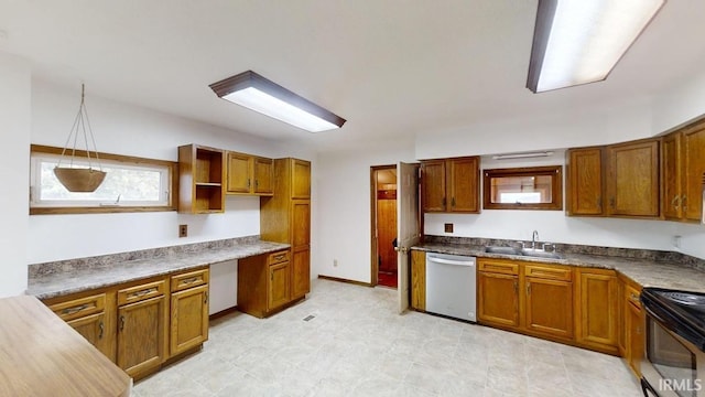 kitchen with black electric range, pendant lighting, dishwasher, and sink