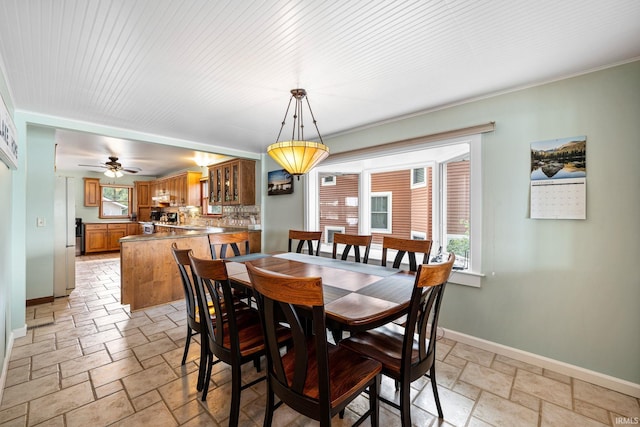 dining area with ceiling fan