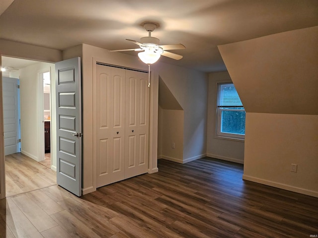 bonus room with ceiling fan and hardwood / wood-style floors