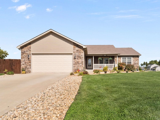 ranch-style house featuring a garage, a front lawn, and a porch