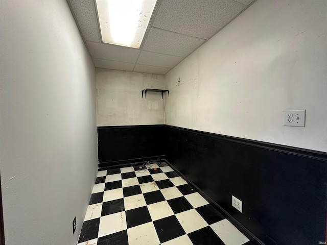 interior space featuring a paneled ceiling