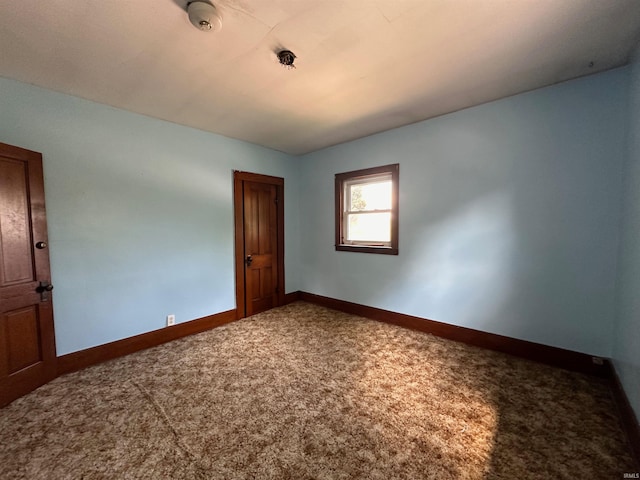 empty room with carpet floors