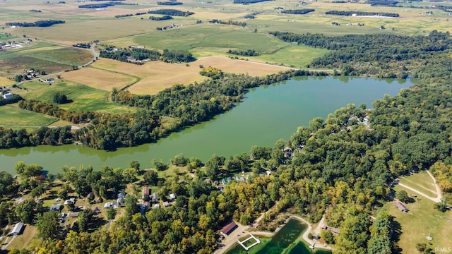 birds eye view of property with a water view and a rural view