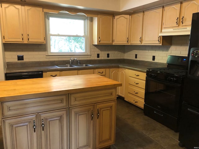 kitchen featuring black appliances, backsplash, sink, and butcher block counters