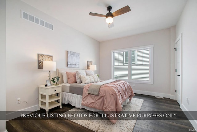 bedroom featuring ceiling fan and dark hardwood / wood-style flooring