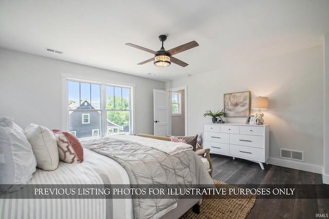 bedroom featuring ceiling fan and dark hardwood / wood-style floors