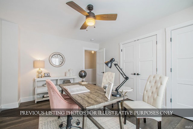 office space featuring dark hardwood / wood-style flooring and ceiling fan