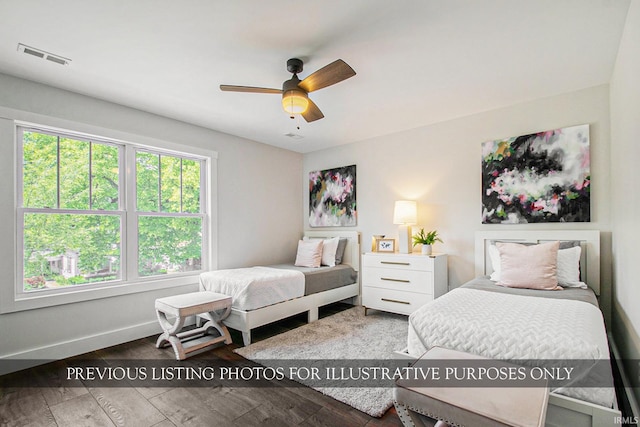 bedroom with ceiling fan and hardwood / wood-style flooring