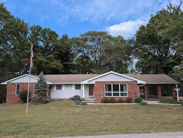 ranch-style home featuring a front yard