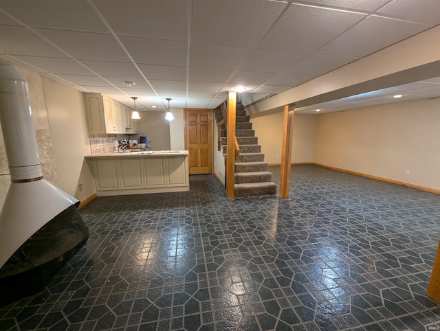 basement with a drop ceiling