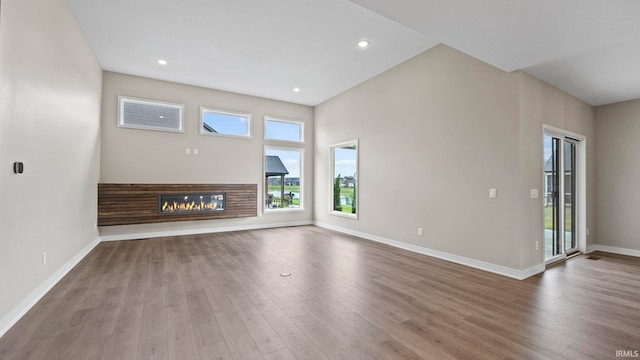 unfurnished living room featuring wood-type flooring