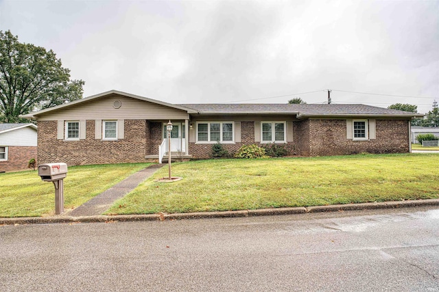 ranch-style house with a front yard