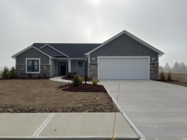 ranch-style home featuring a garage