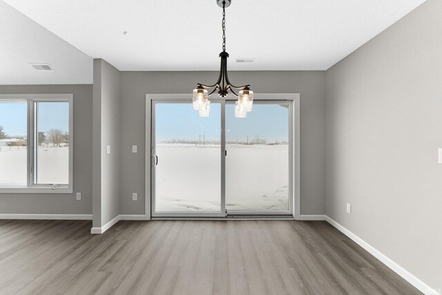 unfurnished room with a textured ceiling and carpet