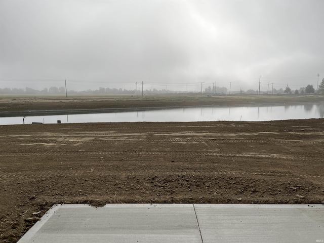 view of yard with a water view