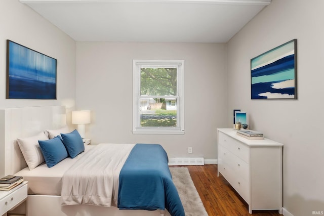 bedroom featuring dark wood-type flooring