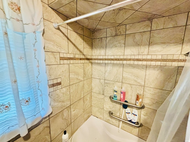 bathroom with shower / bath combo