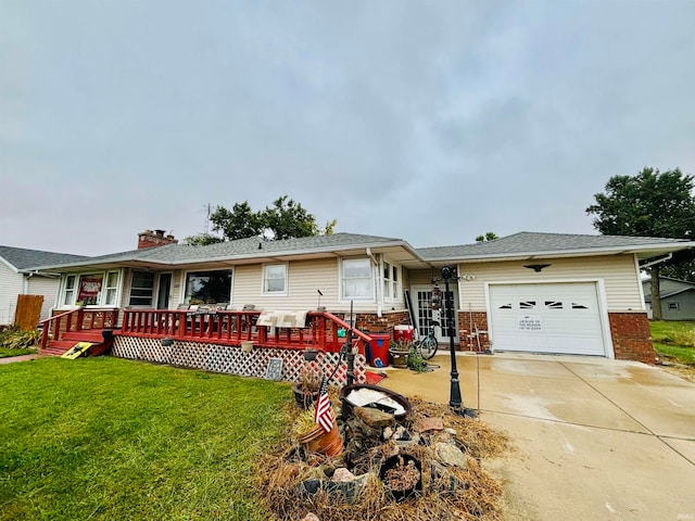 view of front facade with a front lawn and a garage