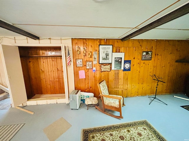 sitting room with wood walls