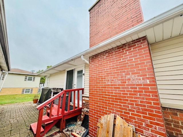 doorway to property with a patio