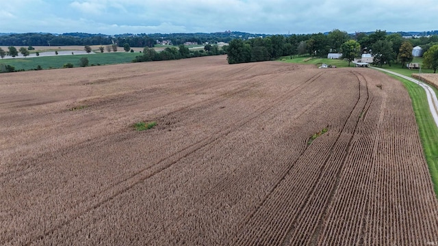 birds eye view of property featuring a rural view