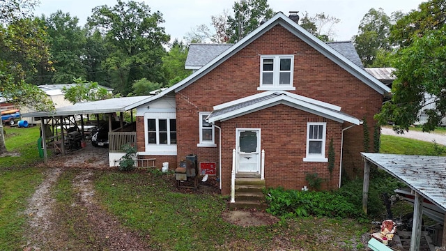 exterior space featuring a carport