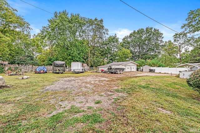 view of yard featuring a storage unit