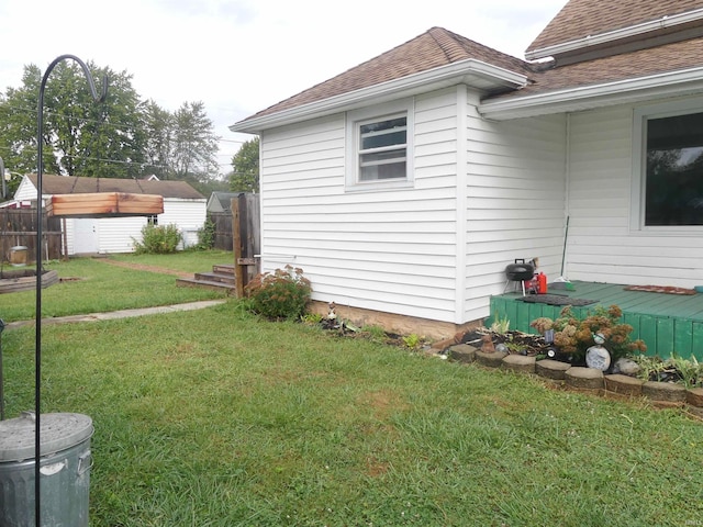 view of home's exterior featuring a lawn