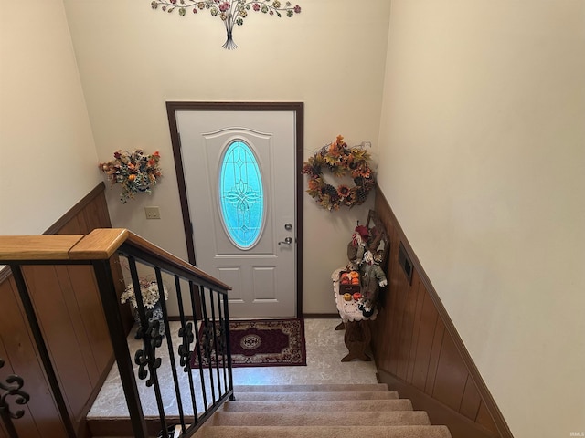 view of carpeted foyer