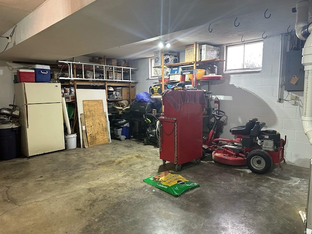 garage with white fridge