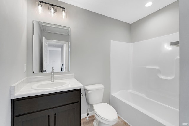 full bathroom with toilet, vanity, and bathing tub / shower combination