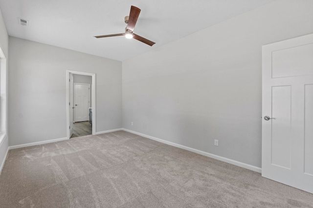 unfurnished bedroom with light carpet and ceiling fan