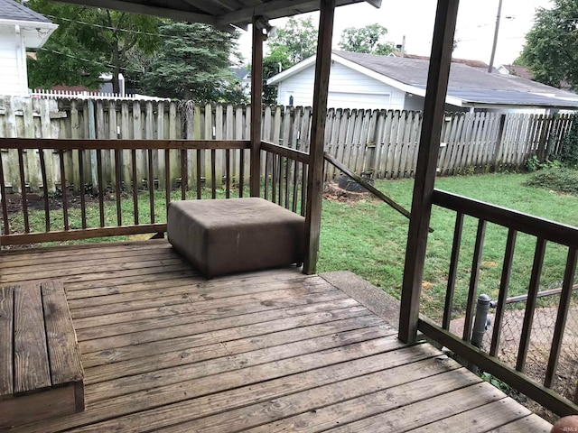 deck featuring a lawn