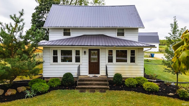 view of front of house with a front lawn