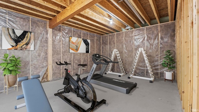 exercise room featuring concrete floors