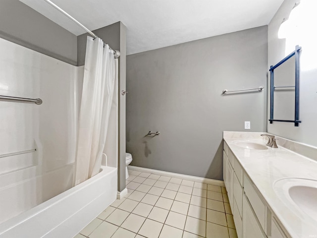 full bathroom featuring tile patterned floors, vanity, shower / bath combination with curtain, and toilet