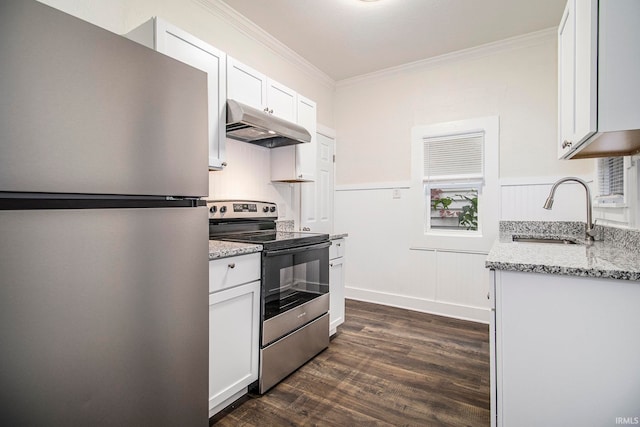 kitchen with dark hardwood / wood-style floors, sink, white cabinetry, appliances with stainless steel finishes, and light stone countertops