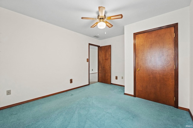 unfurnished bedroom with light carpet and ceiling fan