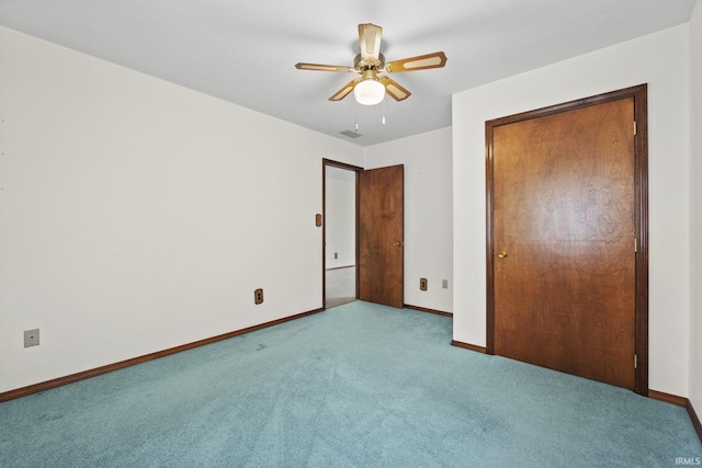 52 Ems B40A1 Ln, Leesburg, IN 46538 - unfurnished bedroom featuring carpet floors, baseboards, and ceiling fan
