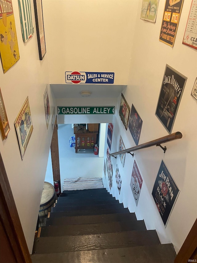 staircase featuring hardwood / wood-style flooring