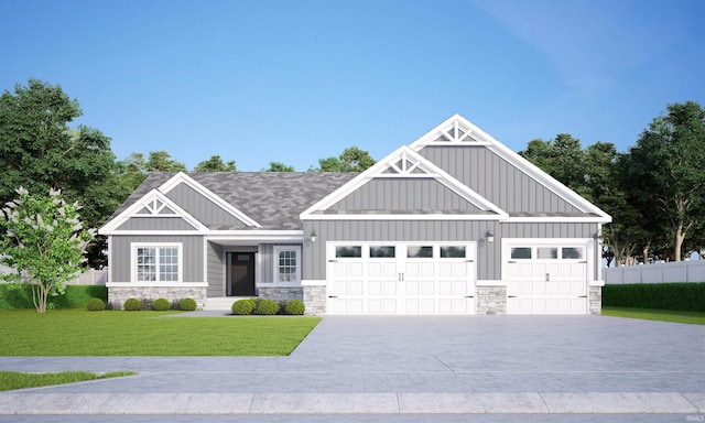 craftsman house with board and batten siding, stone siding, driveway, and an attached garage