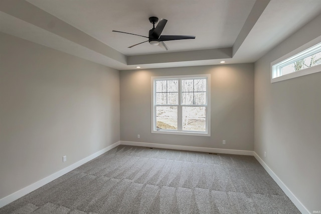 unfurnished room with recessed lighting, carpet flooring, and baseboards