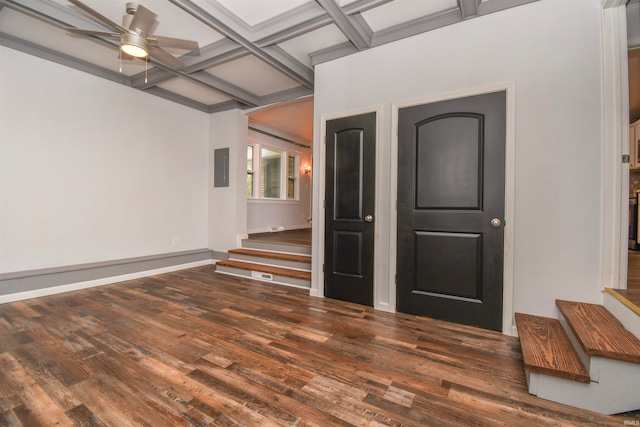 interior space with beamed ceiling, coffered ceiling, dark wood-type flooring, and ceiling fan