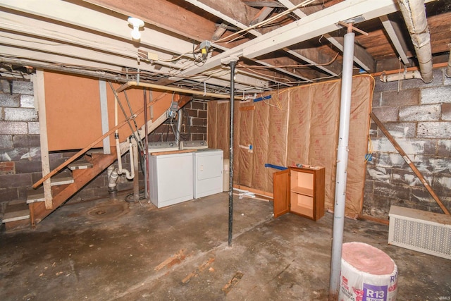 basement featuring washing machine and dryer