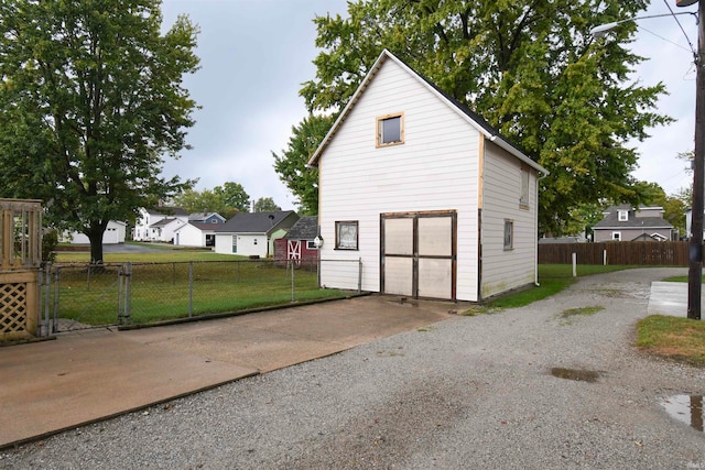 garage with a yard